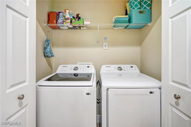 18273 Creekside Preserve Loop Unit 101, Fort Myers, FL 33908 - laundry room with separate washer and dryer