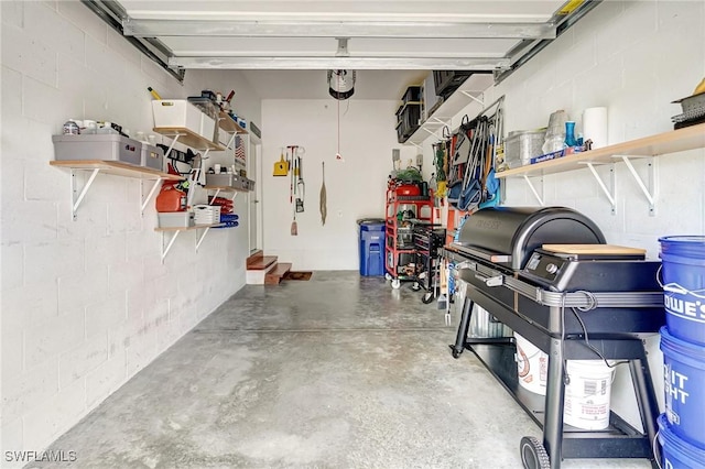 18273 Creekside Preserve Loop Unit 101, Fort Myers, FL 33908 - garage with concrete block wall