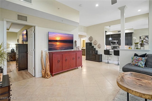 18273 Creekside Preserve Loop Unit 101, Fort Myers, FL 33908 - living room with light tile patterned floors and recessed lighting