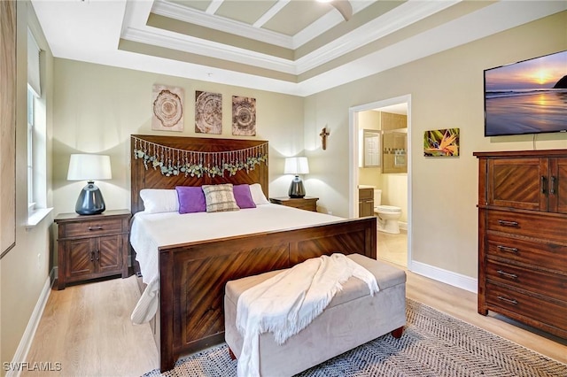 18273 Creekside Preserve Loop Unit 101, Fort Myers, FL 33908 - bedroom featuring ornamental molding, a tray ceiling, light wood finished floors, and ensuite bath