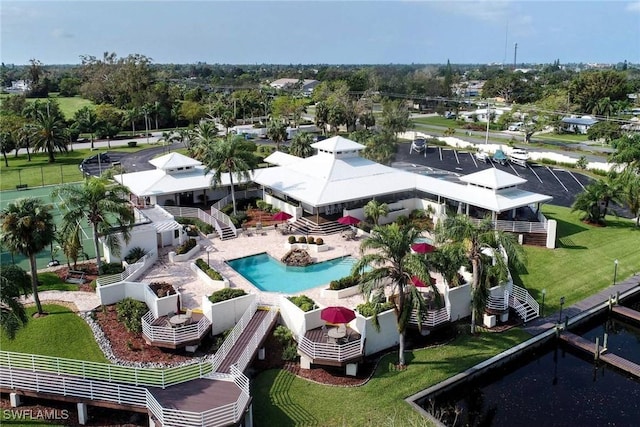 13460 Wild Cotton Ct, North Fort Myers, FL 33903 - bird's eye view of a pool and a tree filled landscape
