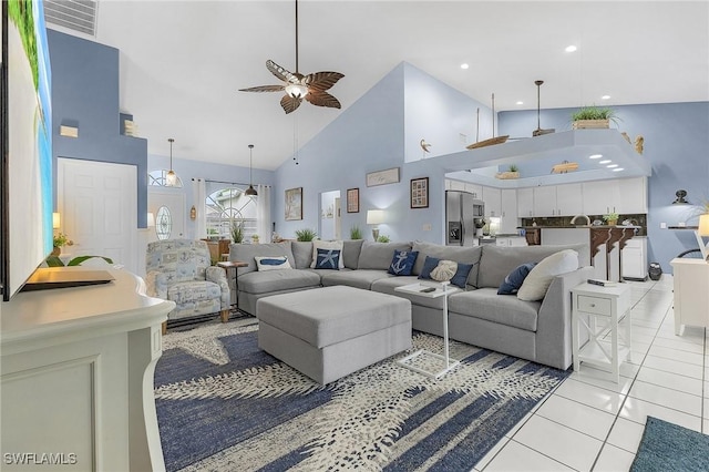 13460 Wild Cotton Ct, North Fort Myers, FL 33903 - living area with high vaulted ceiling, a ceiling fan, and light tile patterned floors