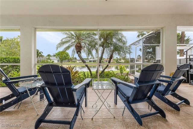 13460 Wild Cotton Ct, North Fort Myers, FL 33903 - sunroom / solarium featuring a water view