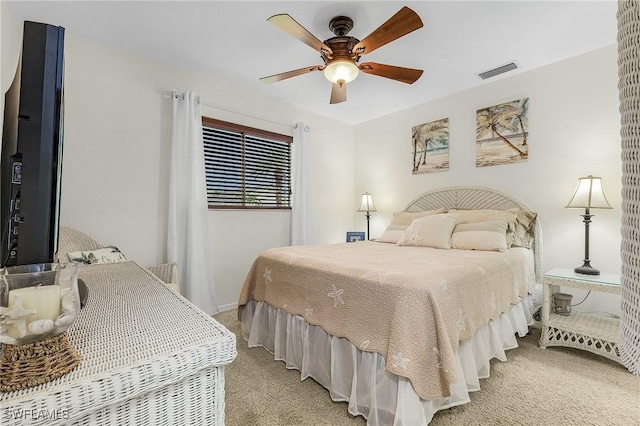 13460 Wild Cotton Ct, North Fort Myers, FL 33903 - bedroom with light carpet, a ceiling fan, and baseboards