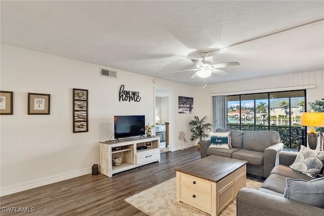 4719 SE 17th Pl Unit 103, Cape Coral, FL 33904 - living area with a ceiling fan and wood finished floors