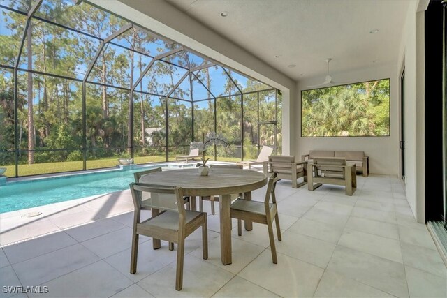 4472 Pine Ridge Rd, Naples, FL 34119 - sunroom / solarium featuring view of scattered trees