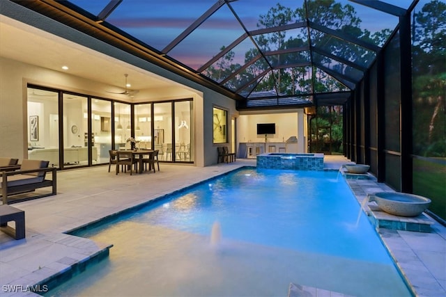 4472 Pine Ridge Rd, Naples, FL 34119 - view of swimming pool with a pool with connected hot tub, a patio area, and a lanai