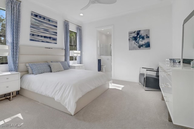 4472 Pine Ridge Rd, Naples, FL 34119 - bedroom with light colored carpet, recessed lighting, ensuite bathroom, and ceiling fan