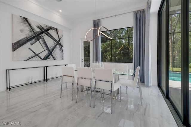 4472 Pine Ridge Rd, Naples, FL 34119 - dining area featuring healthy amount of natural light, marble tiled floors, and a chandelier