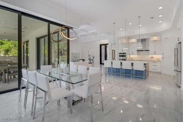 4472 Pine Ridge Rd, Naples, FL 34119 - dining room featuring recessed lighting and light marble finish floors