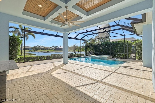 14792 Spinnaker Way, Naples, FL 34114 - view of swimming pool with ceiling fan, a water view, a patio area, and a pool with connected hot tub