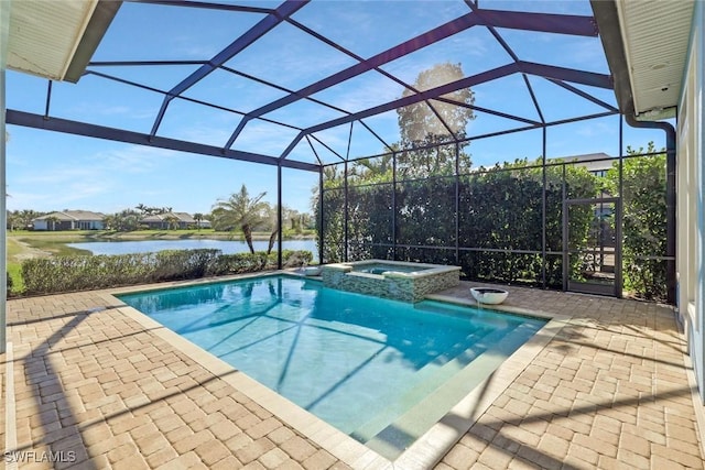 14792 Spinnaker Way, Naples, FL 34114 - view of swimming pool with a water view, a pool with connected hot tub, a patio area, and glass enclosure
