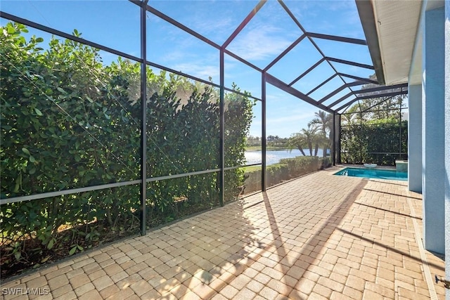 14792 Spinnaker Way, Naples, FL 34114 - view of patio with a water view, a lanai, and an outdoor pool