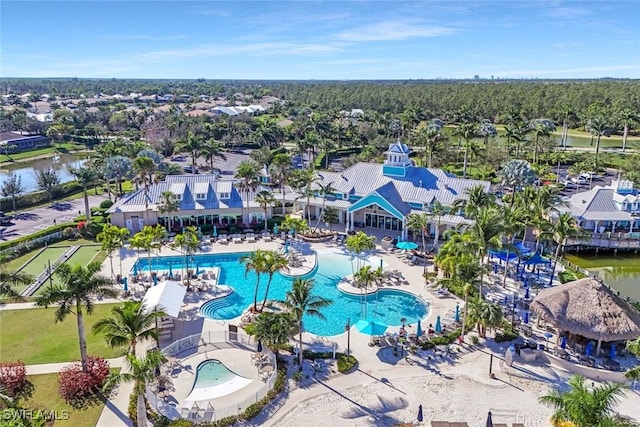 14792 Spinnaker Way, Naples, FL 34114 - aerial perspective of suburban area featuring a pool and a large body of water