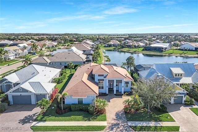 14792 Spinnaker Way, Naples, FL 34114 - aerial view of residential area featuring a nearby body of water