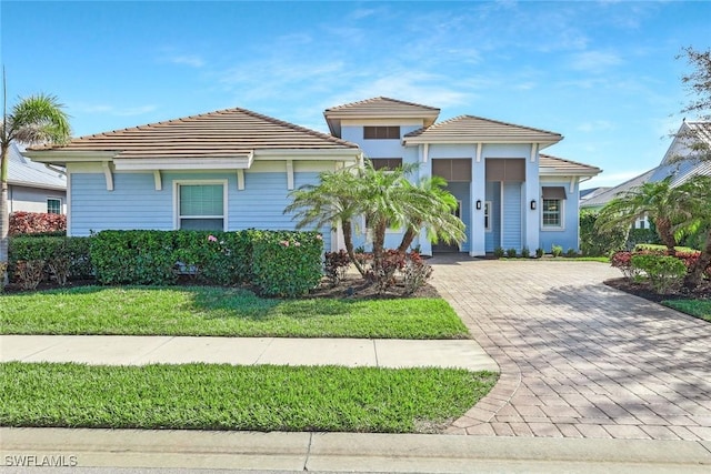 14792 Spinnaker Way, Naples, FL 34114 - view of front of house with decorative driveway