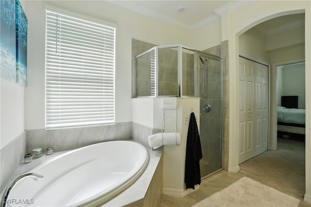 1886 Alameda Dr, Naples, FL 34120 - ensuite bathroom featuring a bath, a stall shower, and ornamental molding