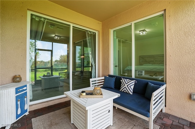 1886 Alameda Dr, Naples, FL 34120 - view of patio featuring outdoor lounge area