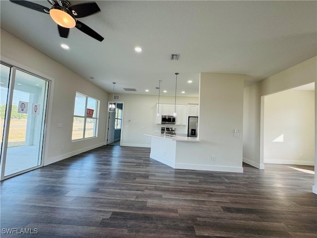 1062 Jay Ct, Labelle, FL 33935 - unfurnished living room with recessed lighting, dark wood-style flooring, baseboards, and ceiling fan