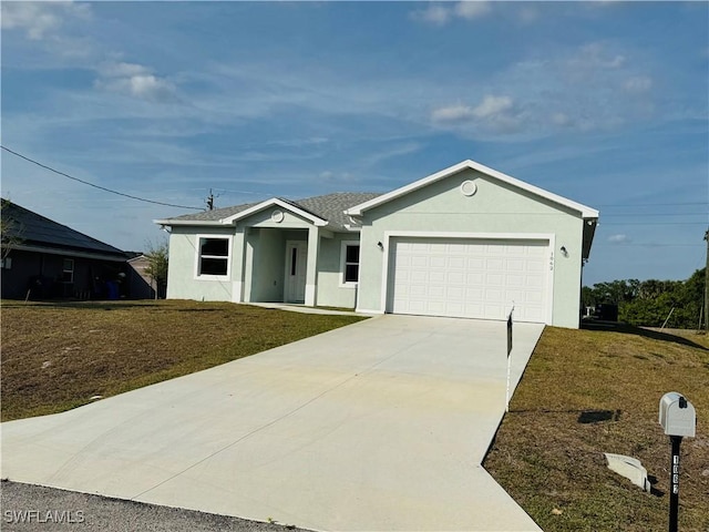 1062 Jay Ct, Labelle, FL 33935 - ranch-style home with driveway, an attached garage, stucco siding, and a front lawn