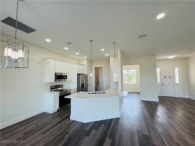 1062 Jay Ct, Labelle, FL 33935 - kitchen featuring appliances with stainless steel finishes, dark wood finished floors, a sink, baseboards, and recessed lighting