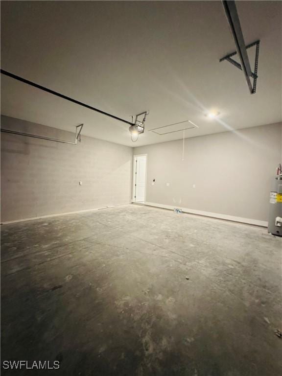 1062 Jay Ct, Labelle, FL 33935 - garage with water heater and a garage door opener