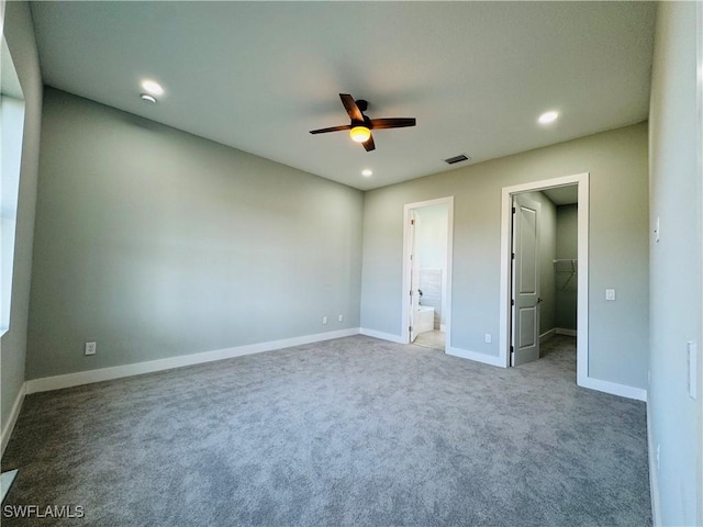 1062 Jay Ct, Labelle, FL 33935 - unfurnished bedroom featuring carpet floors, a spacious closet, recessed lighting, and baseboards