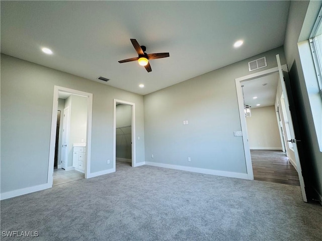 1062 Jay Ct, Labelle, FL 33935 - unfurnished bedroom featuring carpet floors, recessed lighting, baseboards, a walk in closet, and connected bathroom
