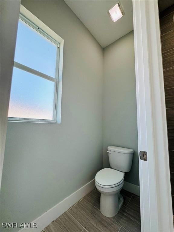 1062 Jay Ct, Labelle, FL 33935 - bathroom with baseboards and toilet