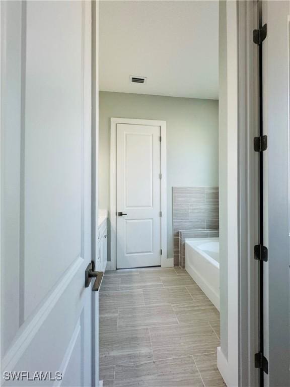 1062 Jay Ct, Labelle, FL 33935 - bathroom with a bath and vanity