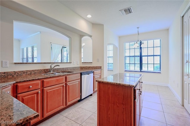 1314 Corso Palermo Ct Unit 1802, Naples, FL 34105 - kitchen with dishwasher, a sink, healthy amount of natural light, stone counters, and recessed lighting