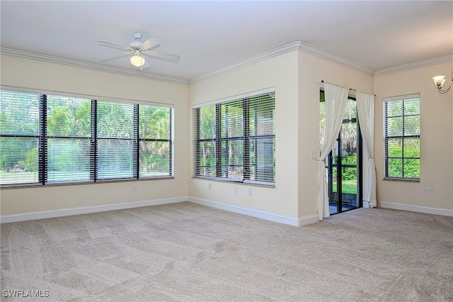 1314 Corso Palermo Ct Unit 1802, Naples, FL 34105 - spare room with crown molding, light carpet, a ceiling fan, and baseboards