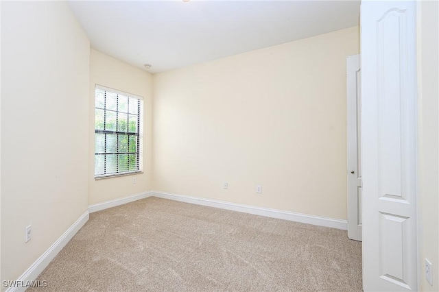 1314 Corso Palermo Ct Unit 1802, Naples, FL 34105 - spare room with light carpet and baseboards