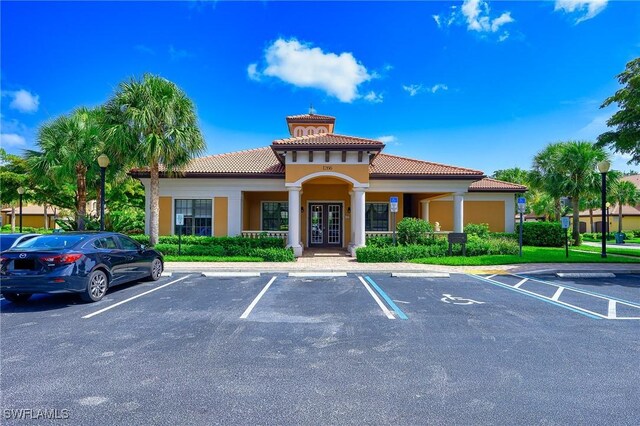 1314 Corso Palermo Ct Unit 1802, Naples, FL 34105 - view of property with uncovered parking