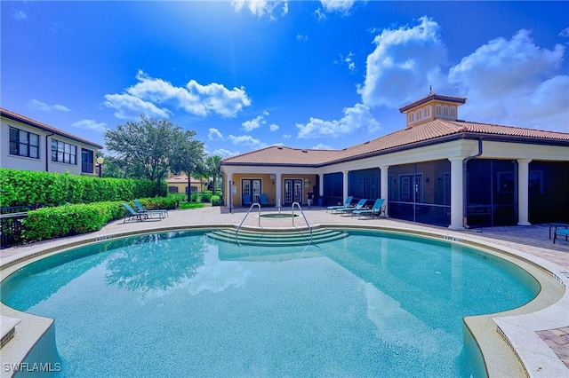 1314 Corso Palermo Ct Unit 1802, Naples, FL 34105 - view of swimming pool featuring a patio area