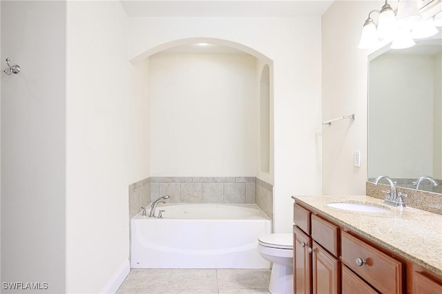 1314 Corso Palermo Ct Unit 1802, Naples, FL 34105 - full bathroom featuring vanity, a bath, toilet, and tile patterned flooring