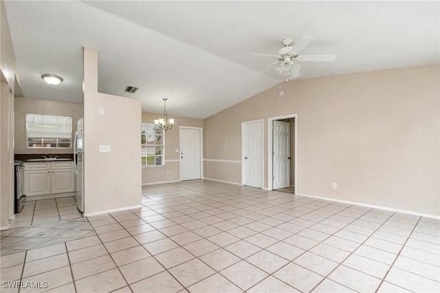 302 NE 10th Ter, Cape Coral, FL 33909 - unfurnished living room with a chandelier, light tile patterned floors, a ceiling fan, and vaulted ceiling