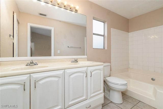 302 NE 10th Ter, Cape Coral, FL 33909 - bathroom featuring double vanity and tile patterned flooring