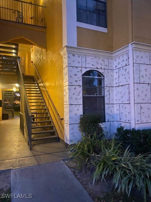 6141 Metrowest Blvd Unit 206, Orlando, FL 32835 - doorway to property featuring stucco siding