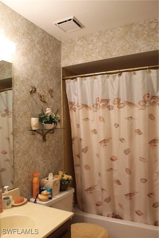 1210 SE 6th Ter Unit 87, Cape Coral, FL 33990 - bathroom featuring vanity, shower / bath combo with shower curtain, and toilet
