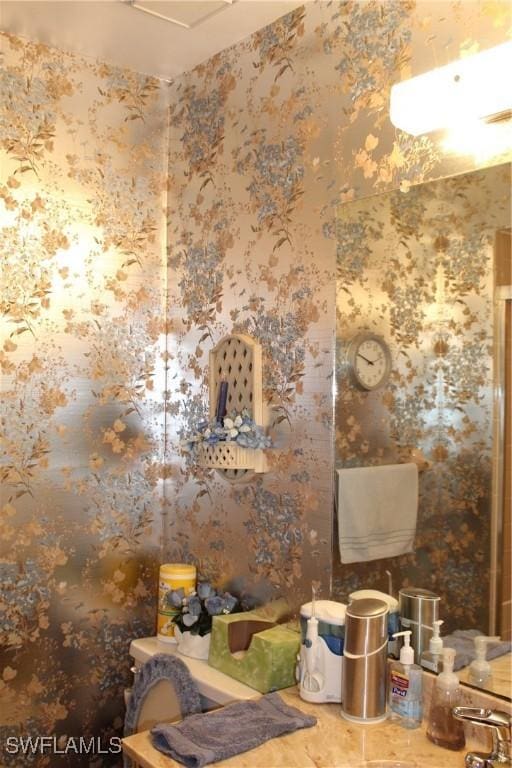 1210 SE 6th Ter Unit 87, Cape Coral, FL 33990 - bathroom with wallpapered walls
