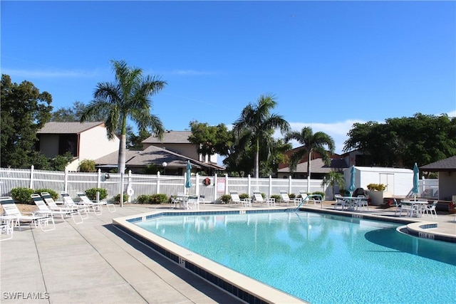 1210 SE 6th Ter Unit 87, Cape Coral, FL 33990 - community pool featuring a patio