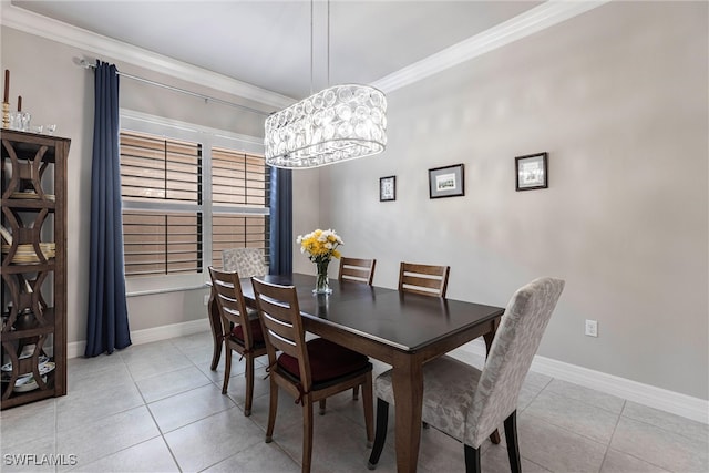 4330 Aurora St, Naples, FL 34119 - dining room featuring light tile patterned floors, crown molding, baseboards, and a chandelier