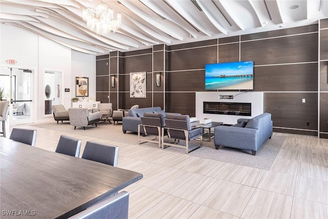 4330 Aurora St, Naples, FL 34119 - community lobby featuring a high ceiling and beam ceiling