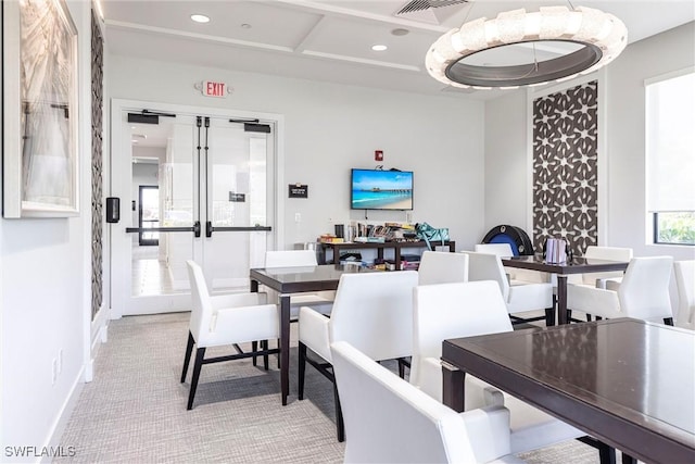 4330 Aurora St, Naples, FL 34119 - dining area with light colored carpet, recessed lighting, french doors, coffered ceiling, and baseboards