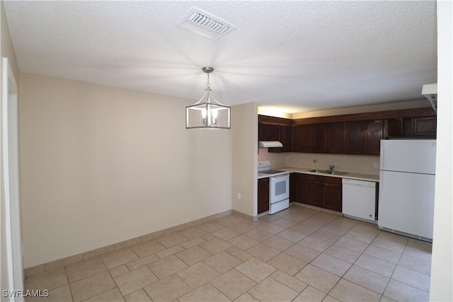 5216 Cedarbend Dr Unit 3, Fort Myers, FL 33919 - kitchen featuring white appliances, a sink, under cabinet range hood, light countertops, and dark brown cabinetry