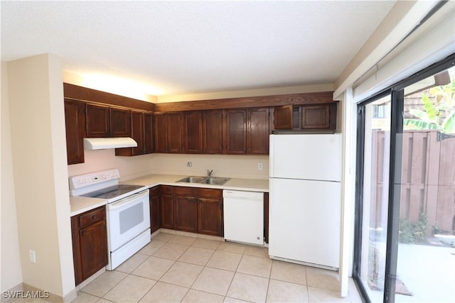 5216 Cedarbend Dr Unit 3, Fort Myers, FL 33919 - kitchen with white appliances, under cabinet range hood, a sink, light countertops, and light tile patterned floors