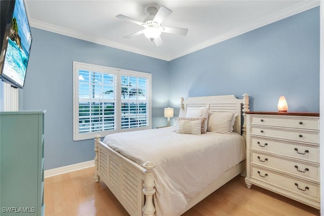 401 Bayfront Pl Unit 3301, Naples, FL 34102 - bedroom with light wood-style floors, ornamental molding, baseboards, and a ceiling fan