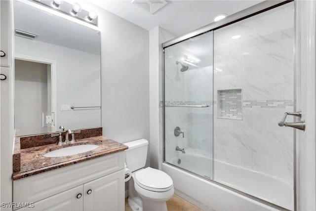 401 Bayfront Pl Unit 3301, Naples, FL 34102 - bathroom featuring vanity, combined bath / shower with glass door, and toilet