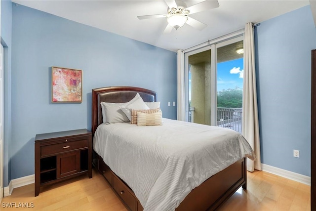 401 Bayfront Pl Unit 3301, Naples, FL 34102 - bedroom featuring access to exterior, light wood-type flooring, baseboards, and ceiling fan